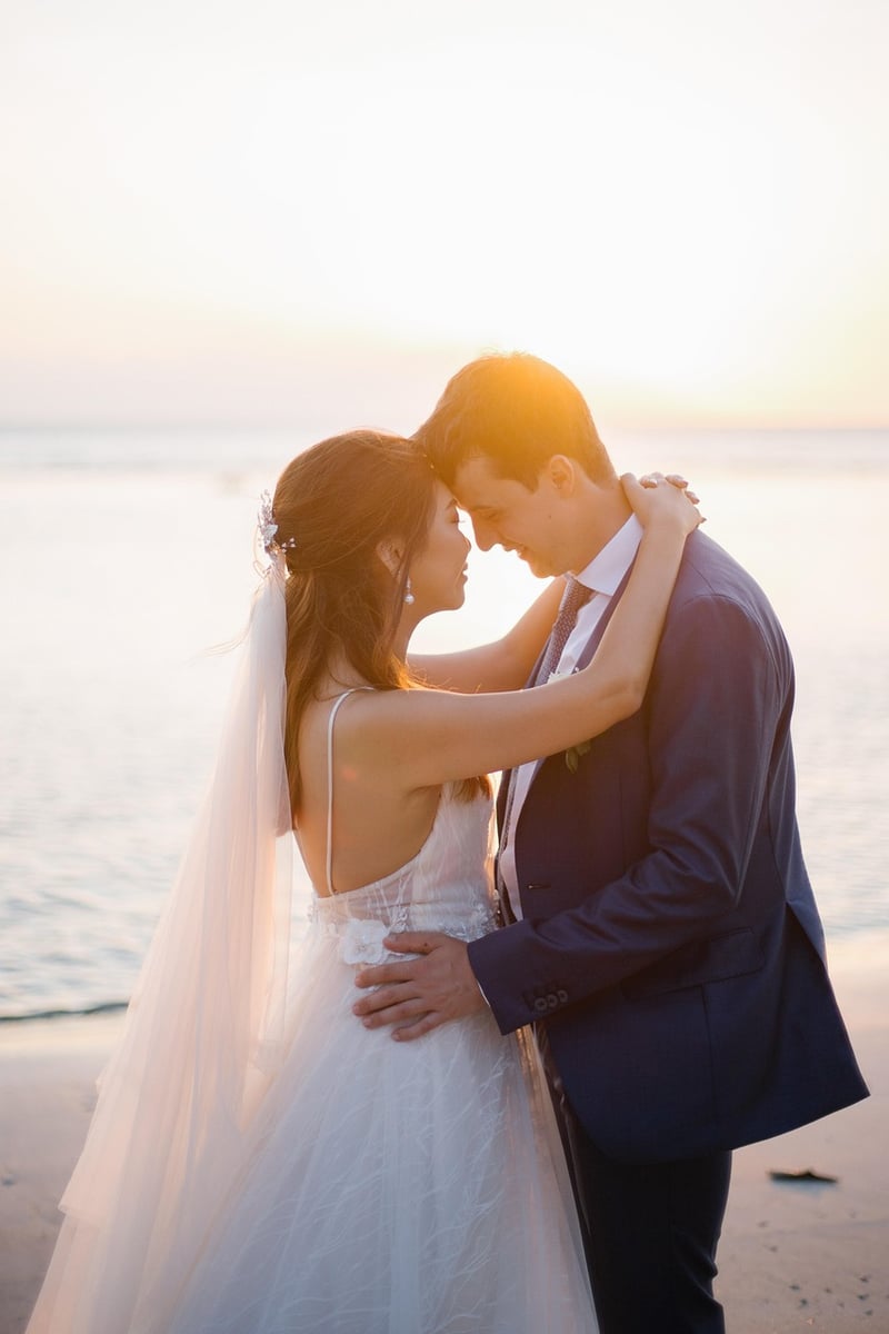 Wedding couple holding hands